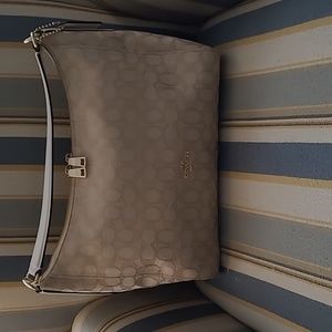 Coach hobo handbag in tan signature canvas